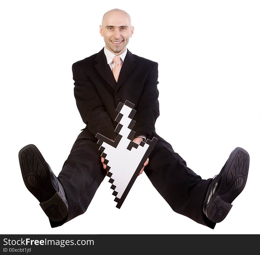 A businessman sits on the floor, holding a large white arrow in his hands. A businessman sits on the floor, holding a large white arrow in his hands.