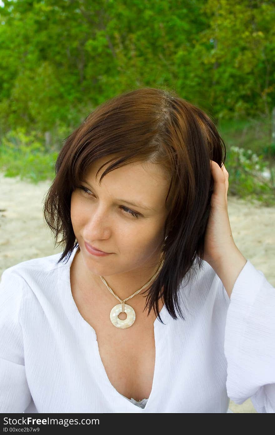 Woman sitting on the beach. Woman sitting on the beach