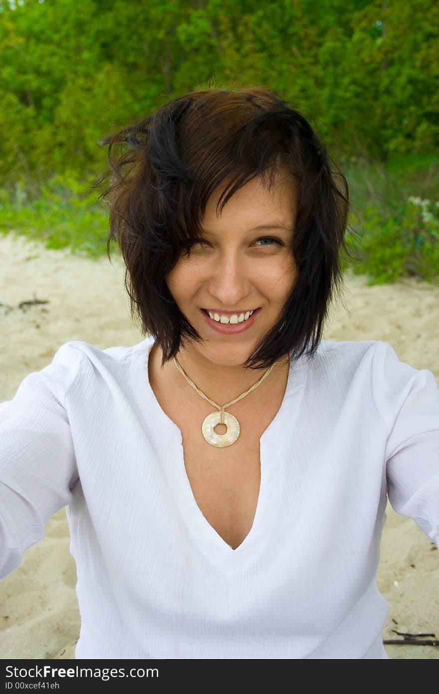 Woman sitting on the beach. Woman sitting on the beach