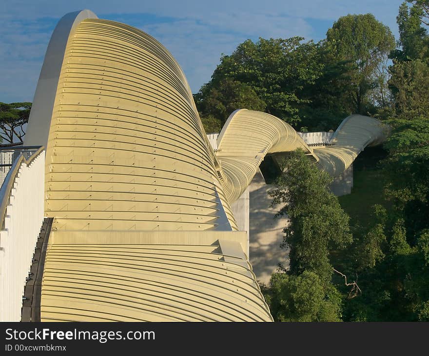 Bridge over a high valley with a sinuous curve design at dawn. Bridge over a high valley with a sinuous curve design at dawn