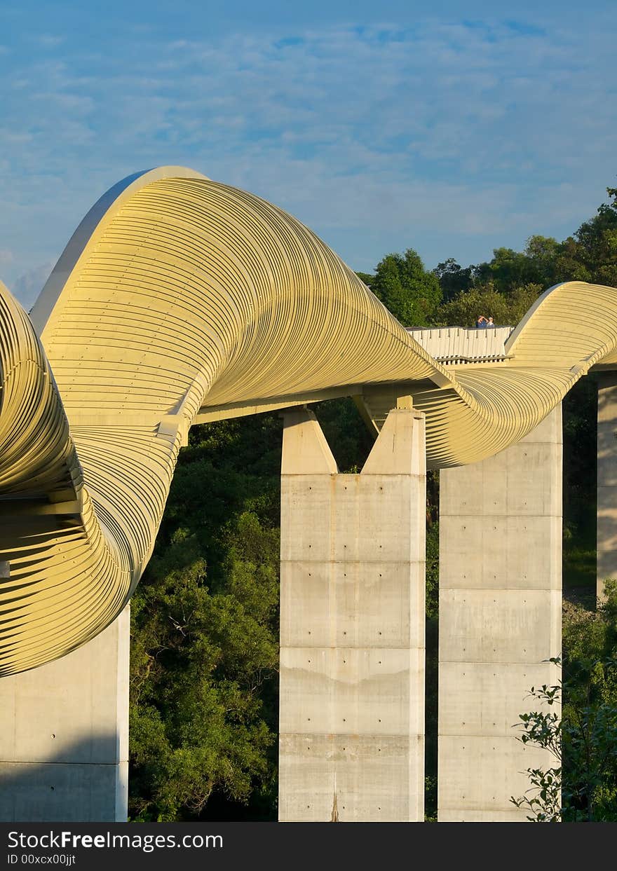 Bridge over a high valley with a sinuous curve design at dawn. Bridge over a high valley with a sinuous curve design at dawn