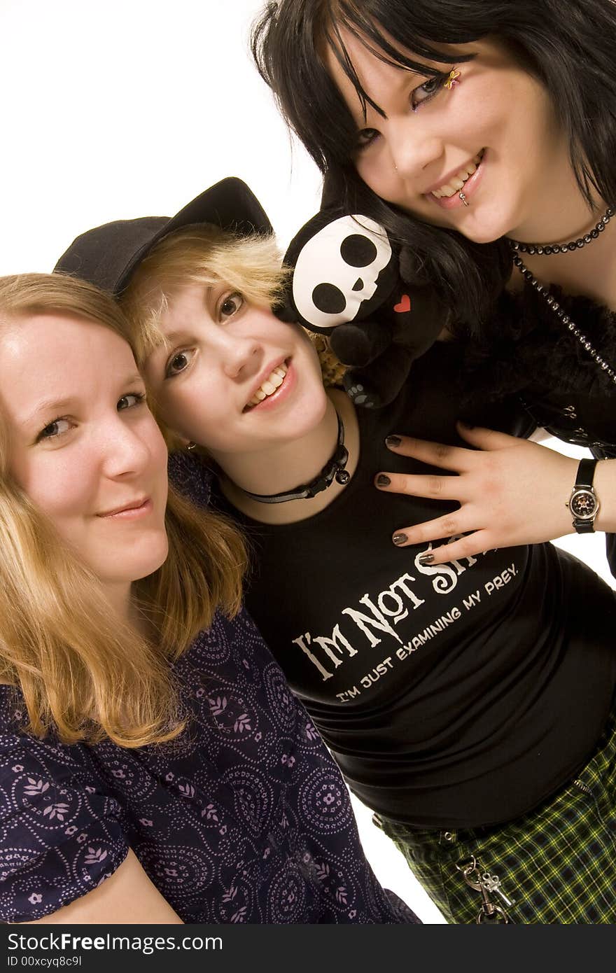 Three young girls on white background. Three young girls on white background