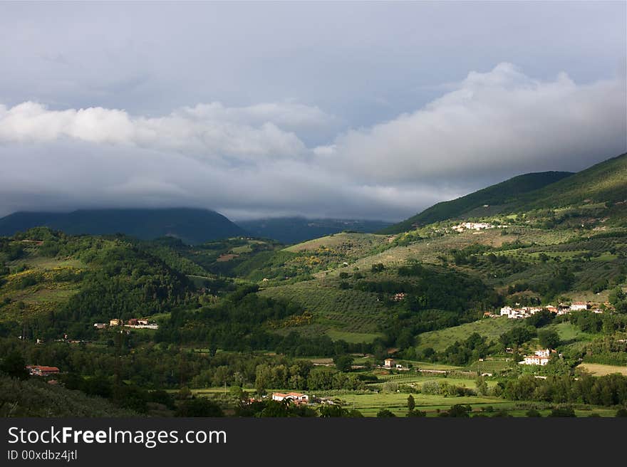 Umbria mountains with clouds near Foligno. Umbria mountains with clouds near Foligno