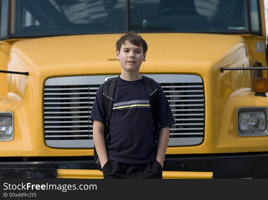 Student near the school bus