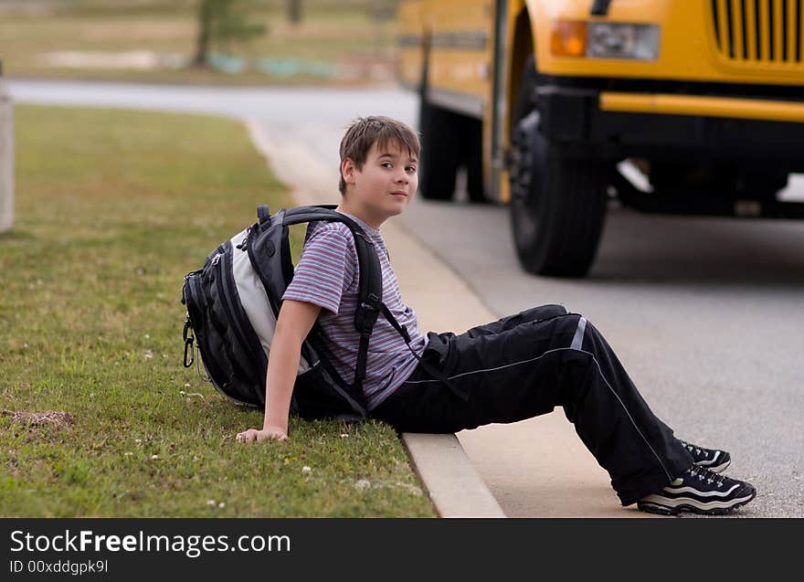 Student near the school bus