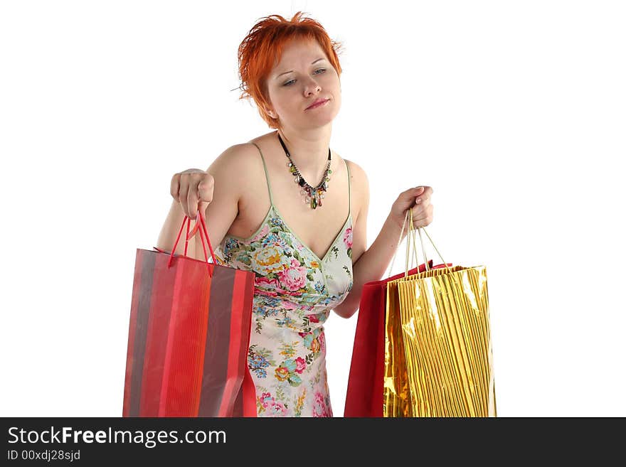 Shopping. Happy woman with different bags with purchases