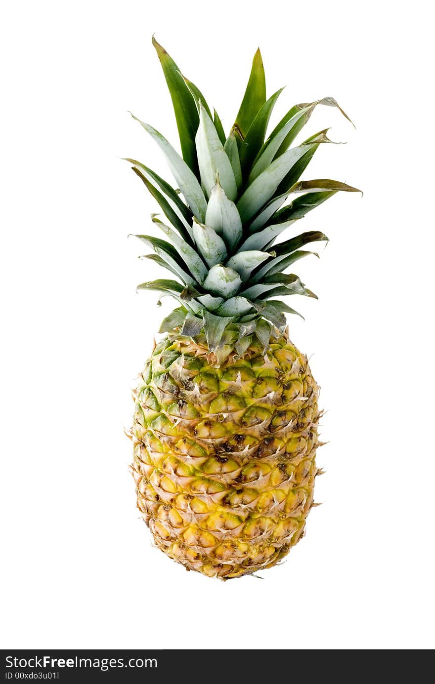 A whole pineapple isolated on a white background.