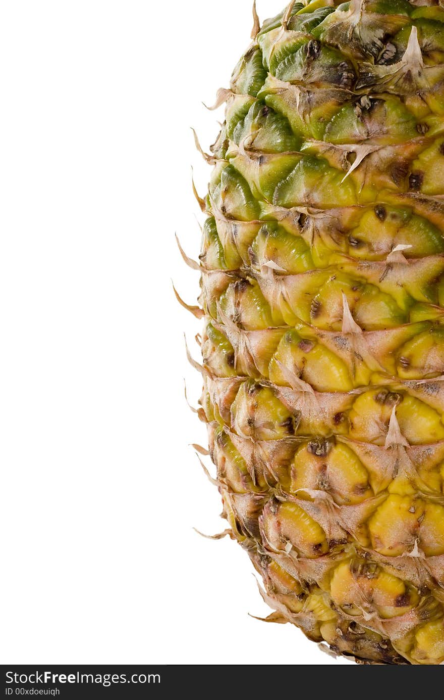 A whole pineapple isolated on a white background.