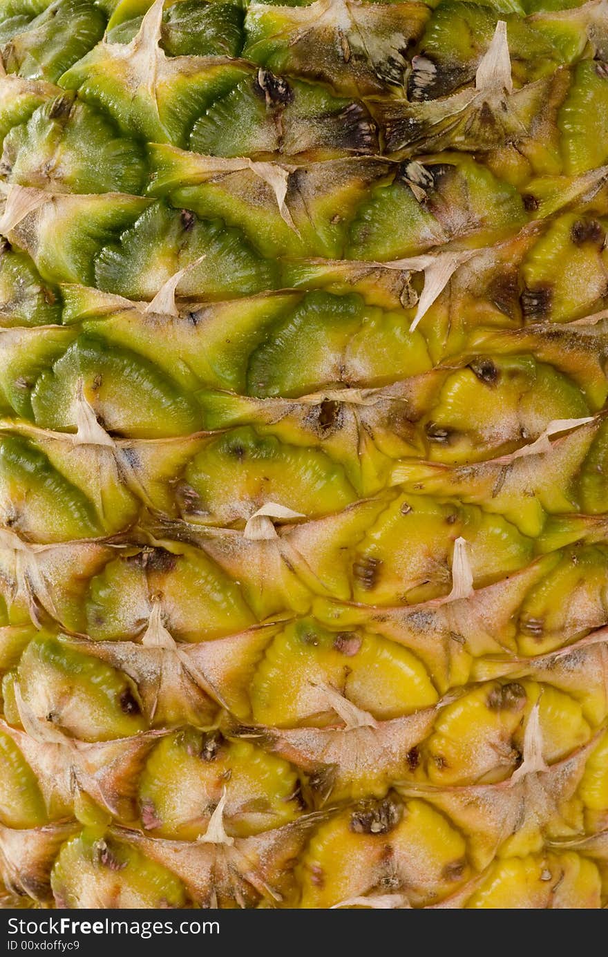 A whole pineapple isolated on a white background.