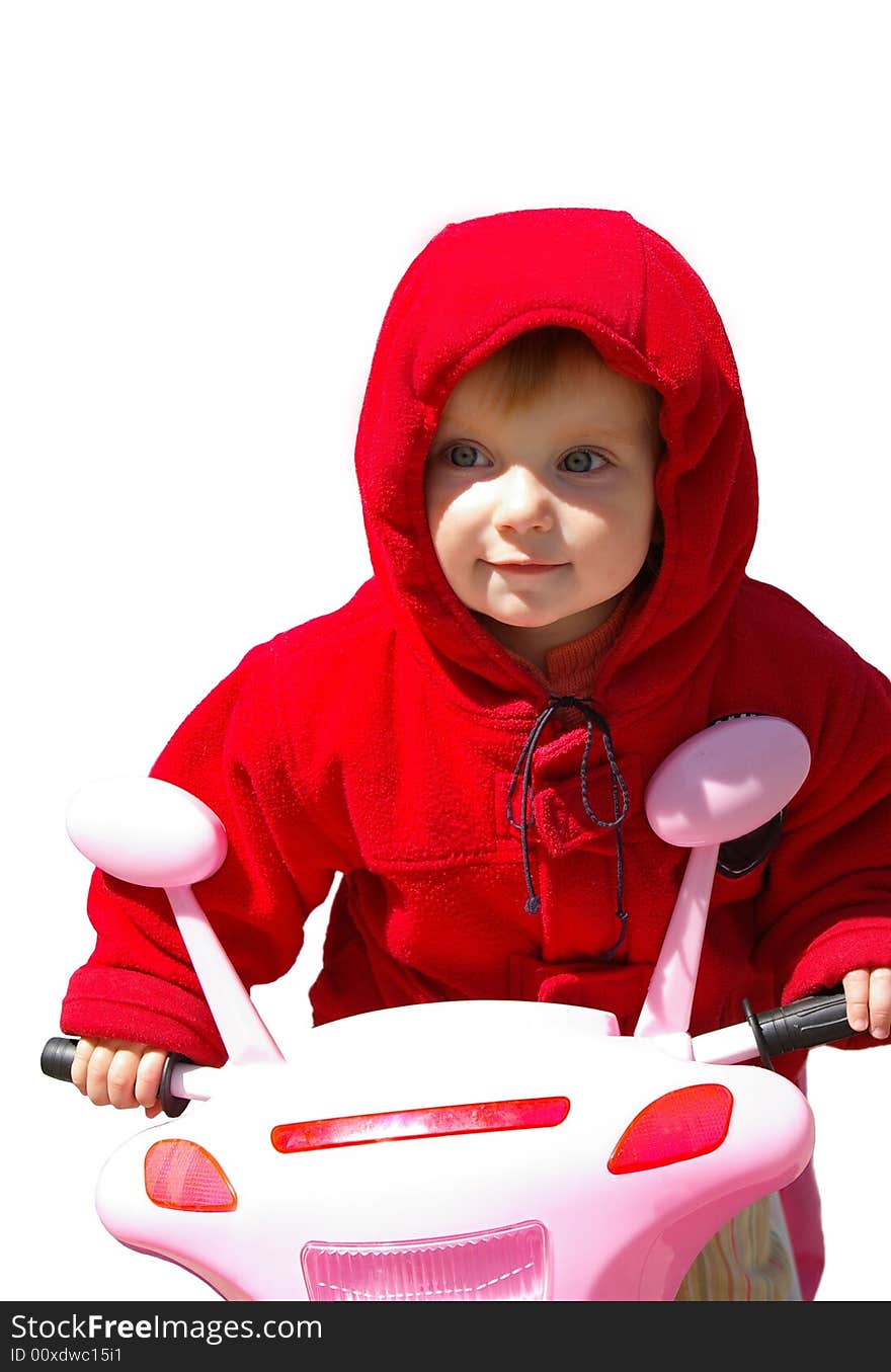 The little nice girl and her tricycle. The little nice girl and her tricycle