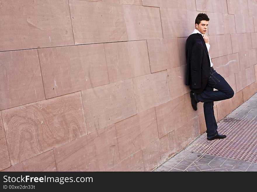 Businessman on wall