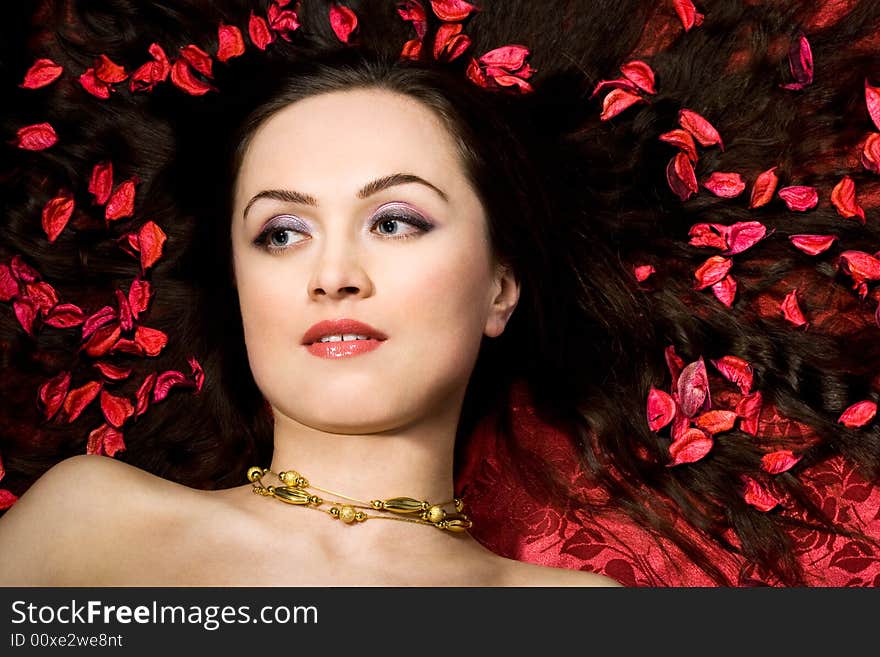 Beautiful Woman In Red Petals