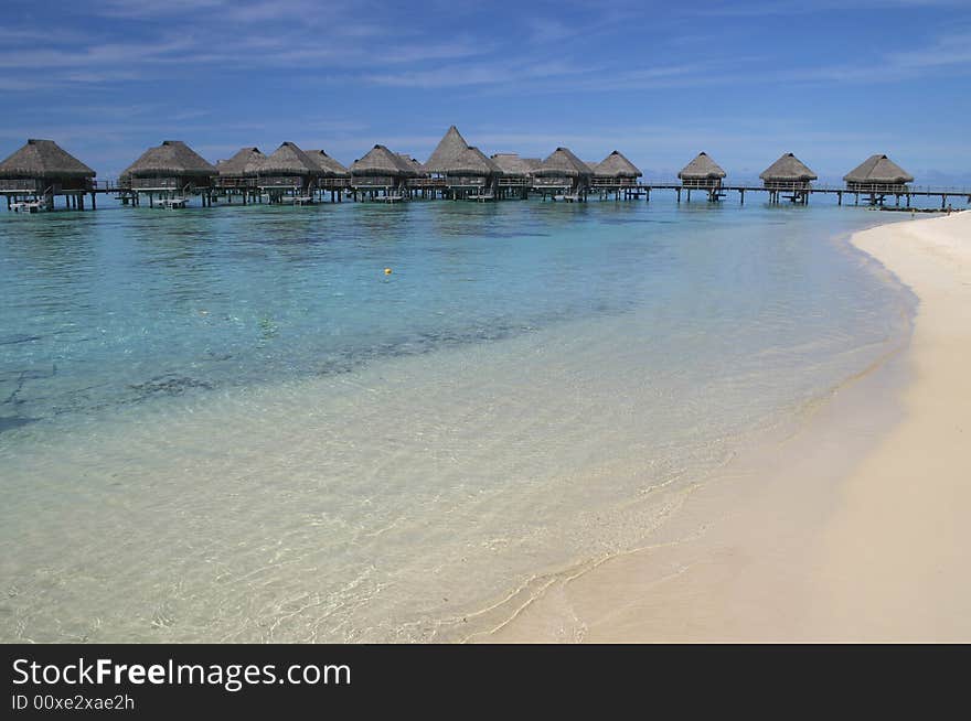 Over water bungalows at a Moorea resort. Island Moorea. French Polynesia