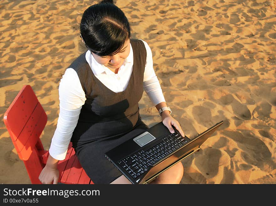 Working on beach's sand under the warm sun. Working on beach's sand under the warm sun