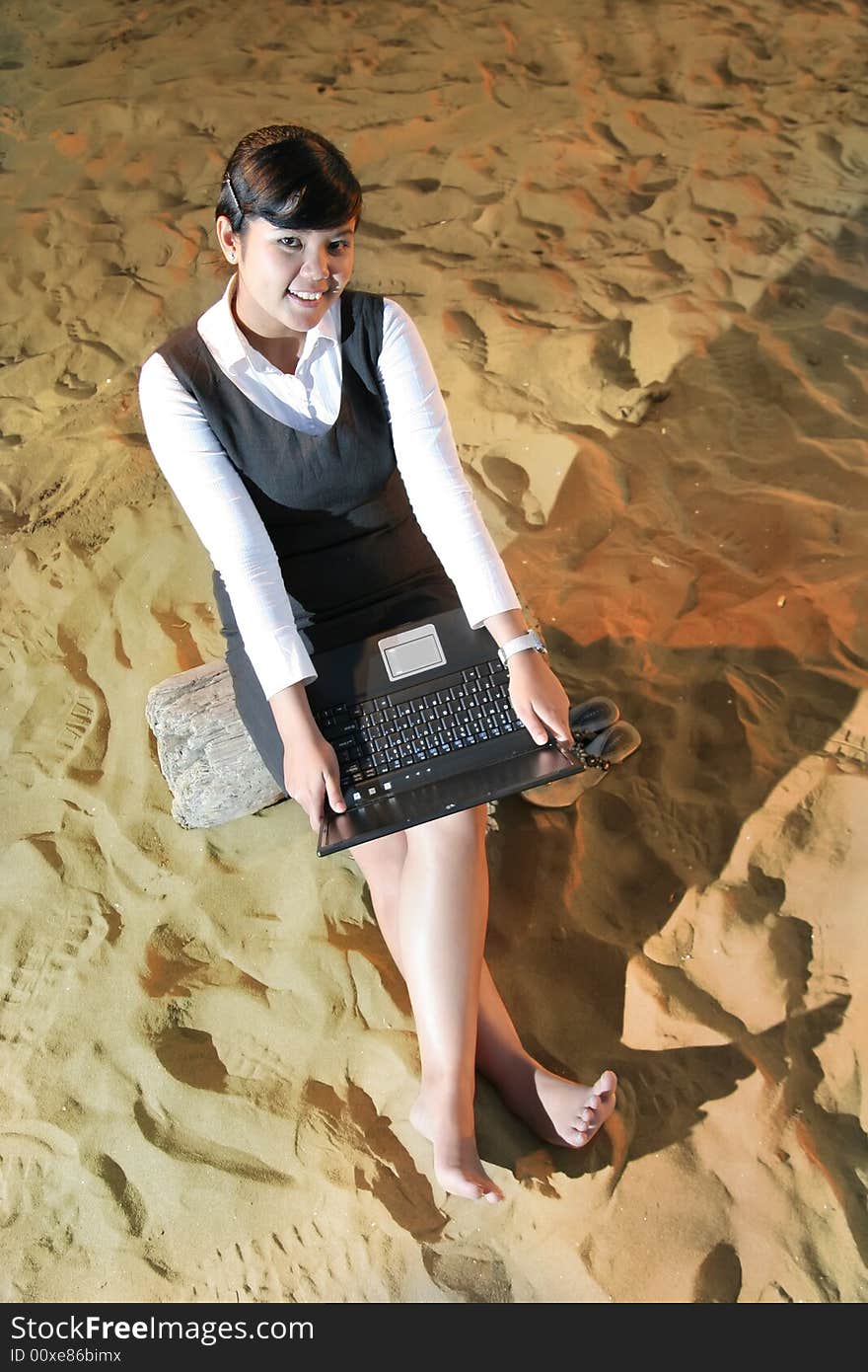 Business Woman On The Beach Sand