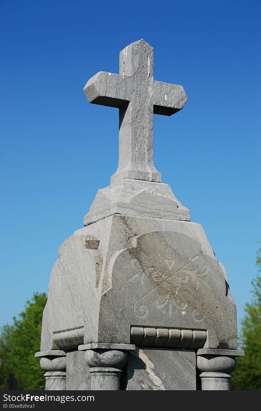 Cross of granit on historic memorial monument. Cross of granit on historic memorial monument