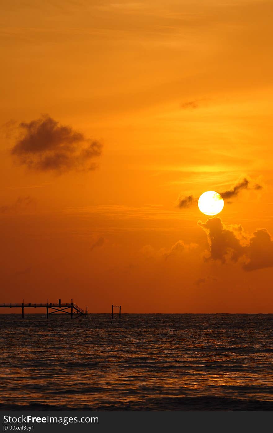 Sunset And Pier