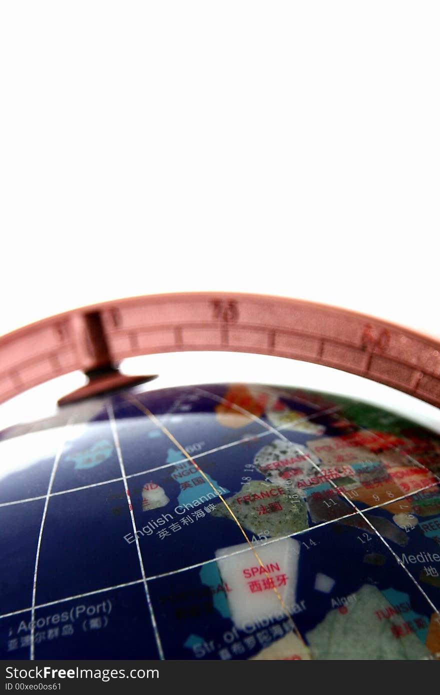 A partial view of a globe showing the European continent.