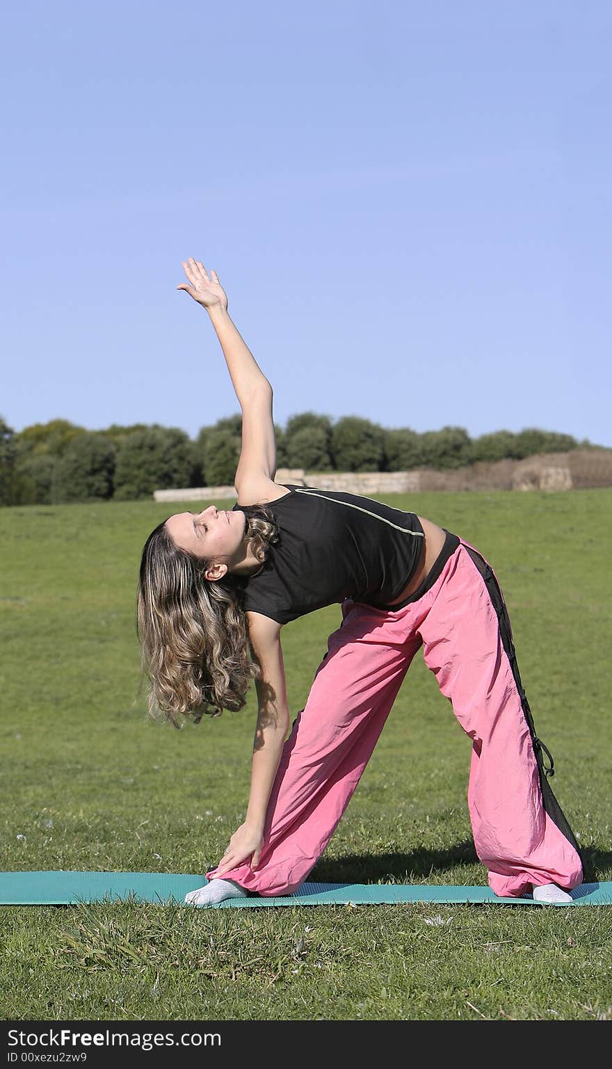 Woman stretching in the park