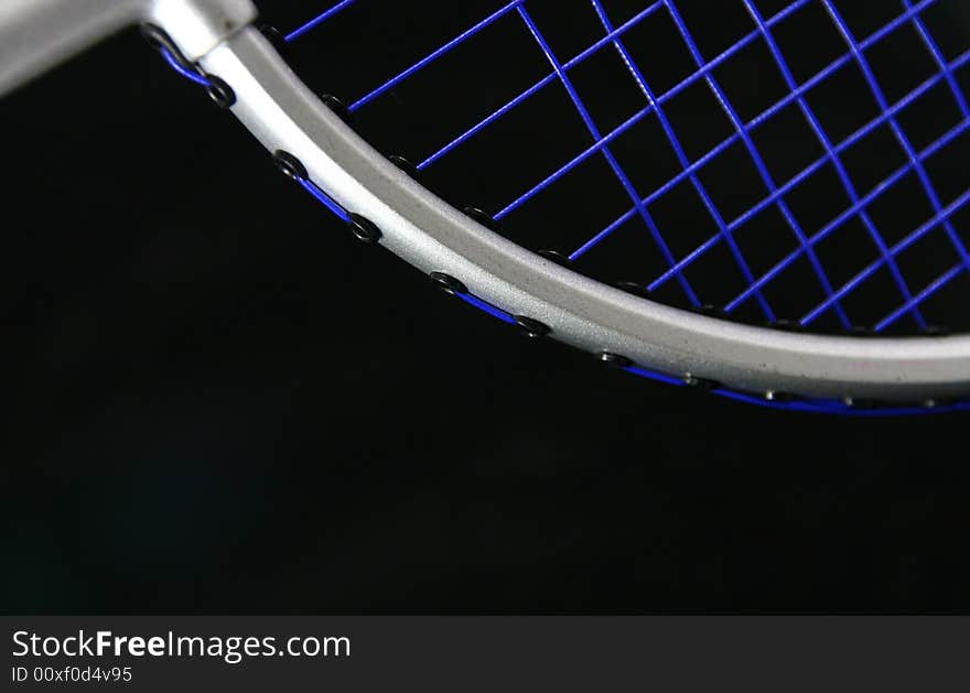 Partial view of a badminton racquet