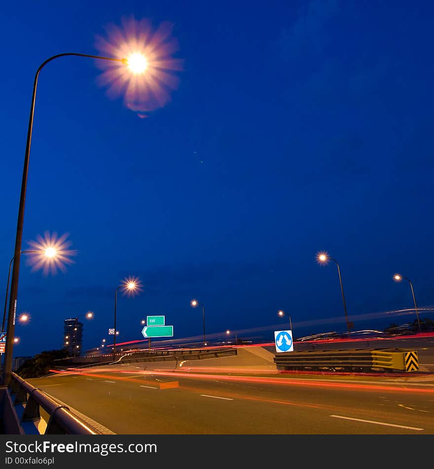 Exit ramp on a highway at twilight