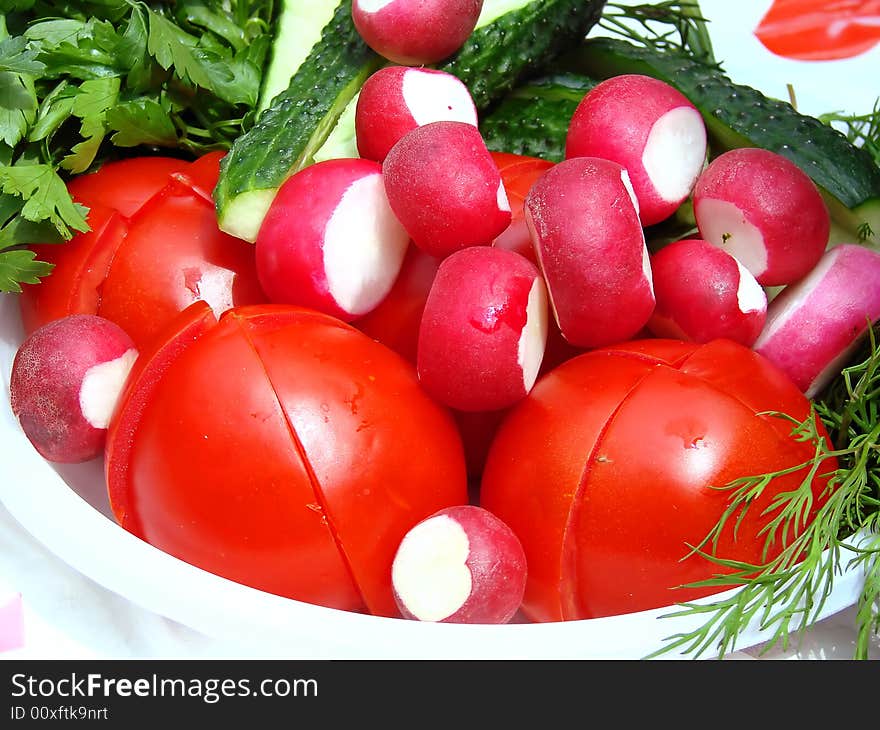 Fresh vegetables assorted on the white plate