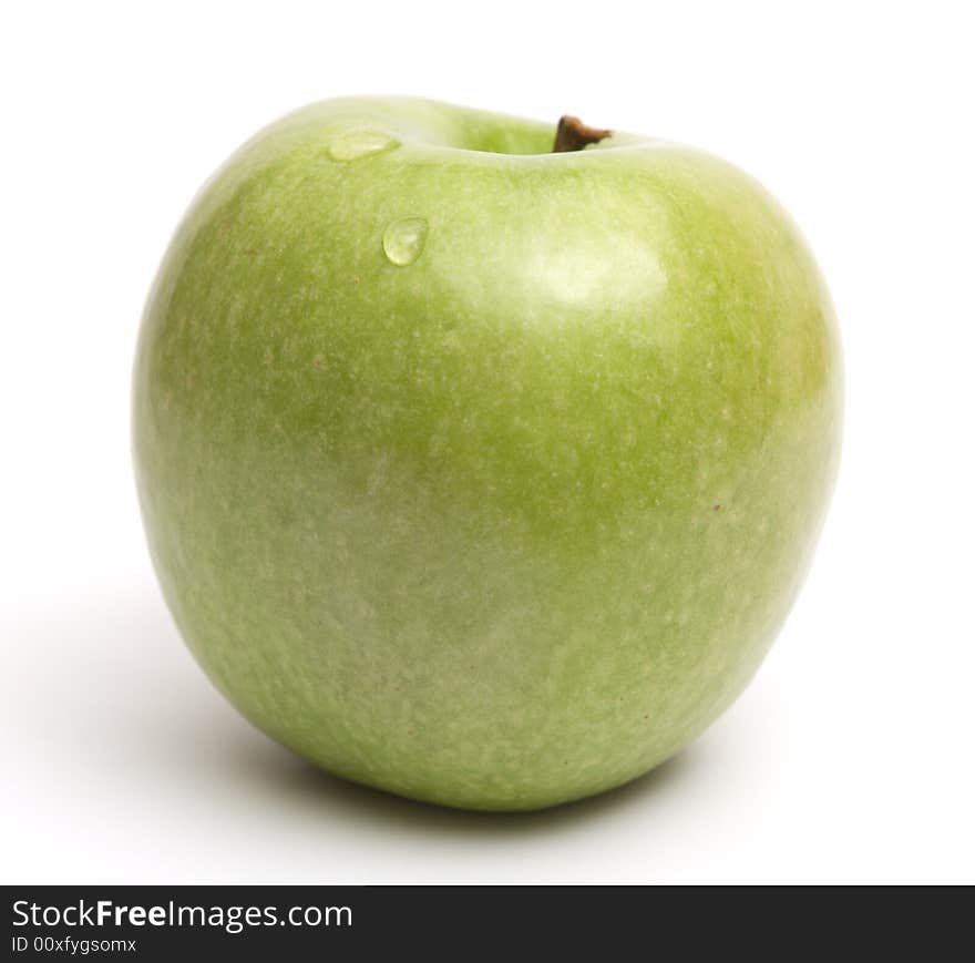 Green Apple Over White Background