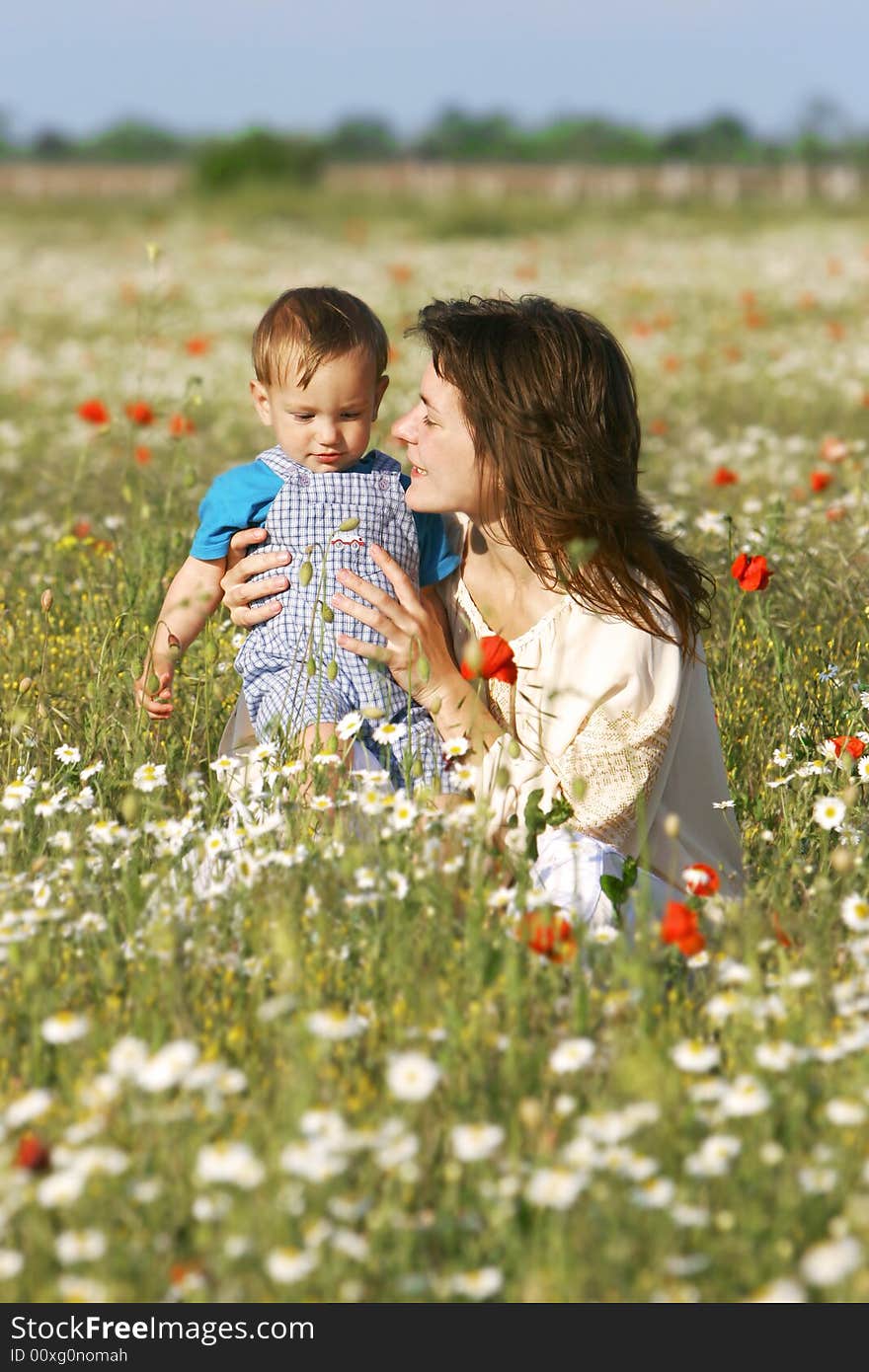 Mother and son in flowers