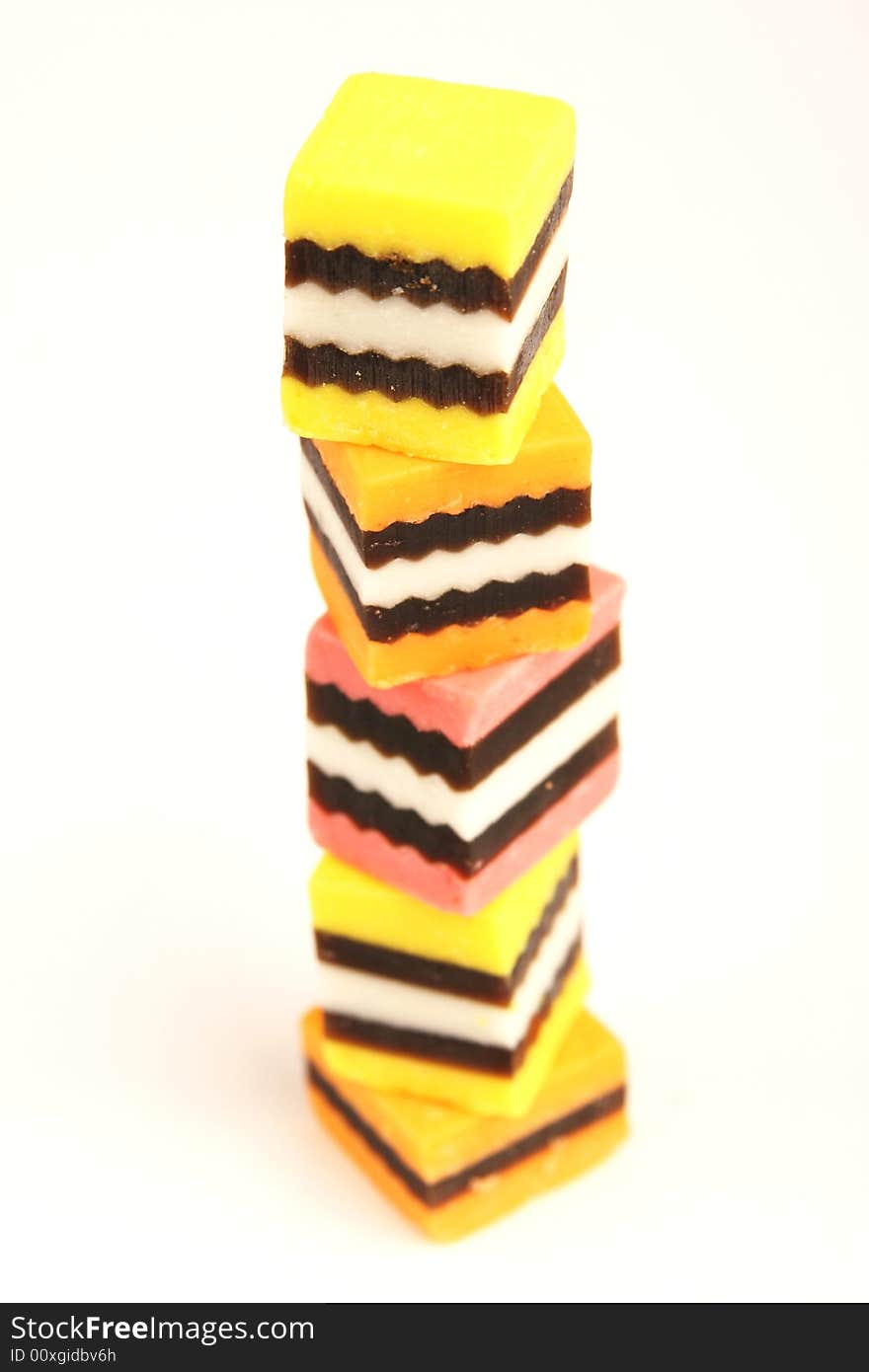 Isolated Licorice pieces stacked on top of each other