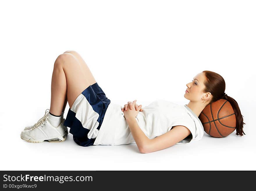 Young beautiful female basket ball player