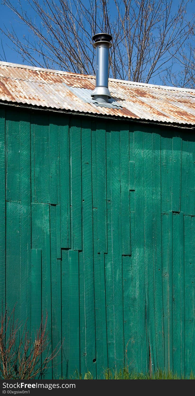 Wooden Wall of Farmhouse painted Gree, the traditional color for California Barns. Wooden Wall of Farmhouse painted Gree, the traditional color for California Barns