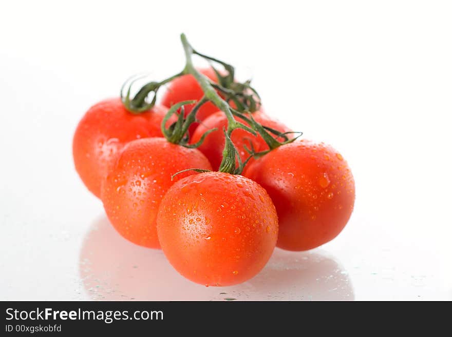 Fresh tomatoes, isolated on white