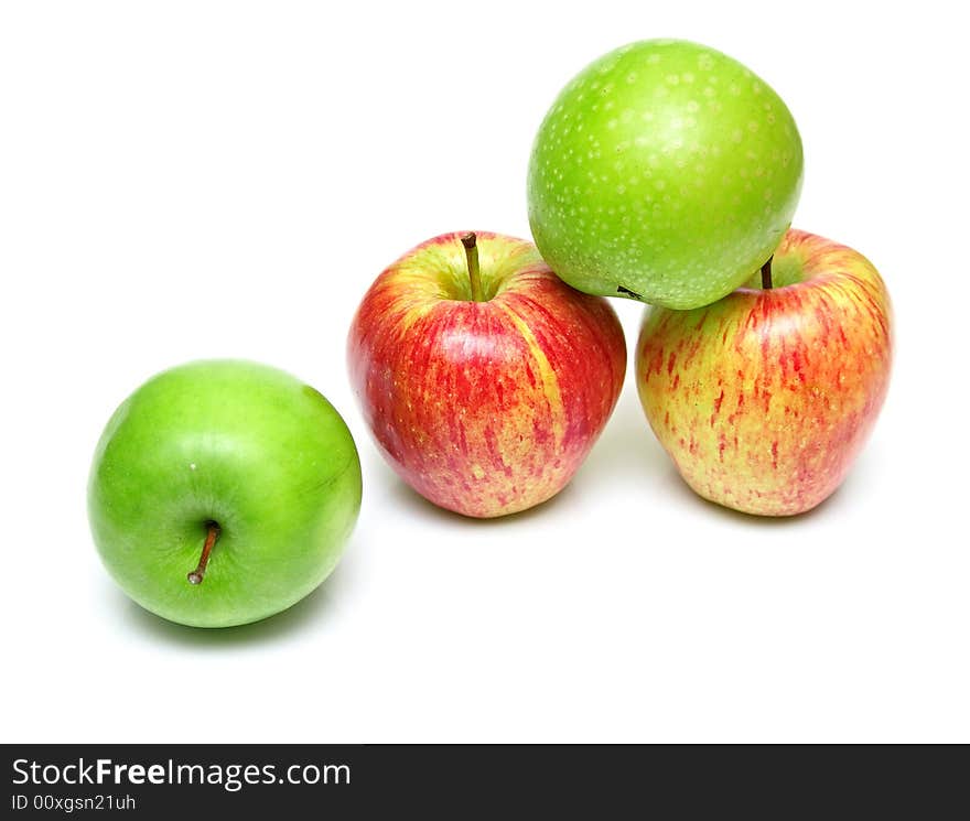 The ripe juicy apples on white. Isolation, shallow DOF. The ripe juicy apples on white. Isolation, shallow DOF.