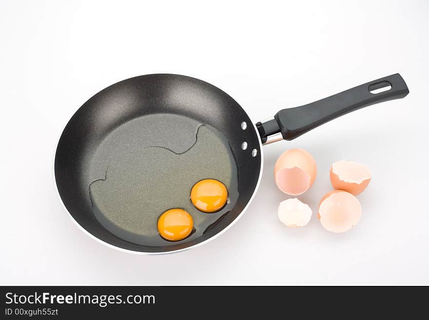 Yolks and broken eggs, isolated