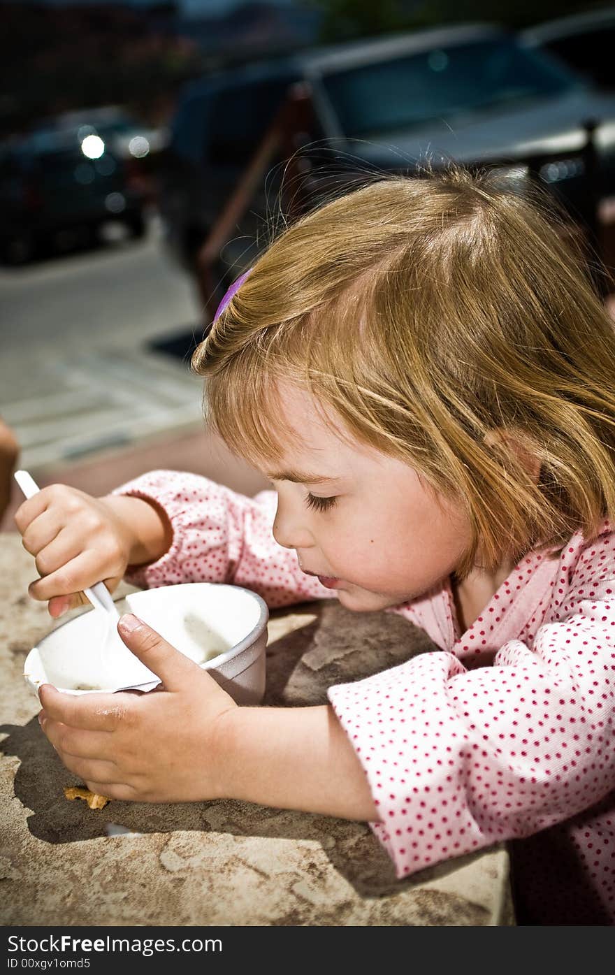 A three year old child playing.