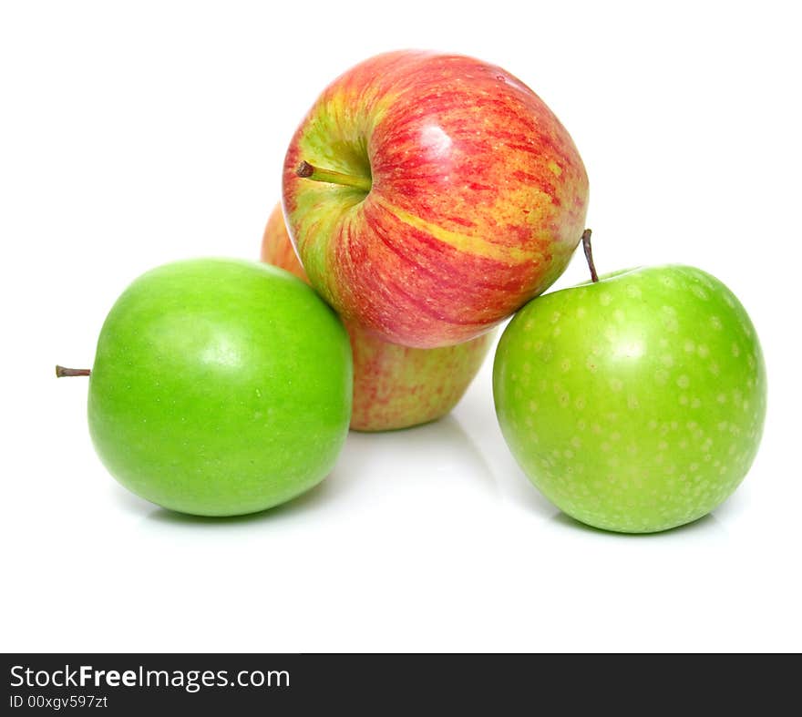 The ripe juicy apples on white. Isolation, shallow DOF. The ripe juicy apples on white. Isolation, shallow DOF.