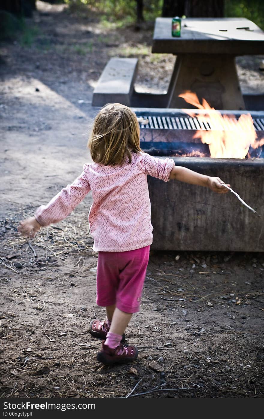 A three year old child playing.