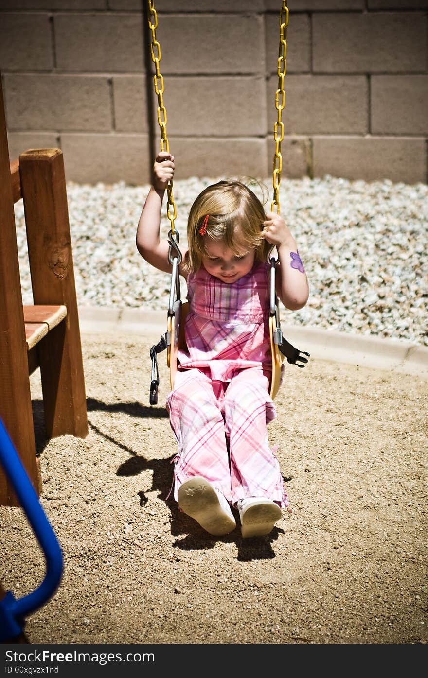 A three year old child playing.