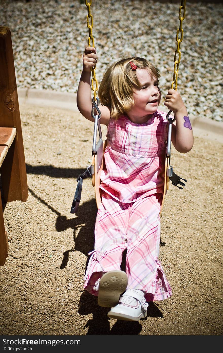 A three year old child playing.