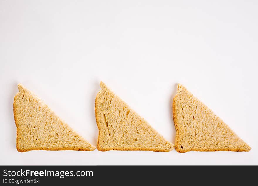 Sliced bread background, isolated on white