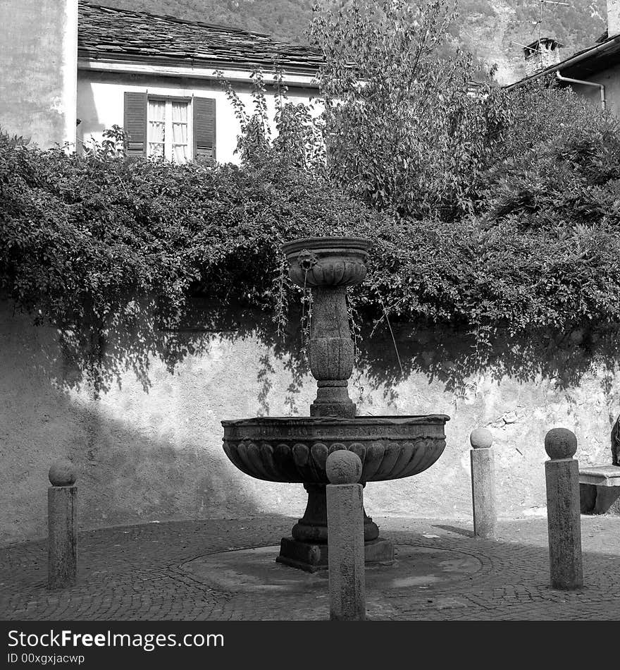 Fountain with water in a garden