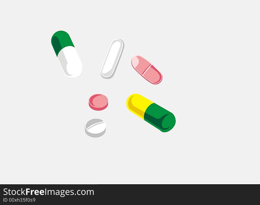 Various kinds of tablets spread out on a table. Various kinds of tablets spread out on a table