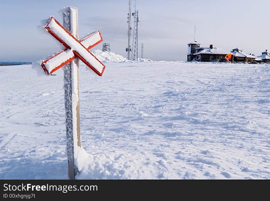 A caution mark in the snowland near the Ski Village. A caution mark in the snowland near the Ski Village.