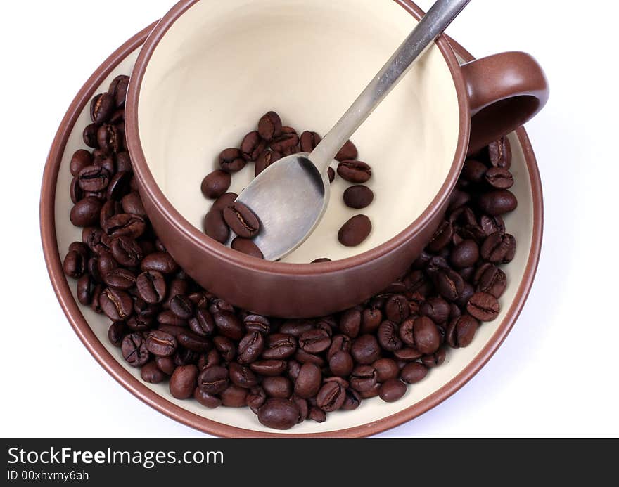 Cup with coffee beans