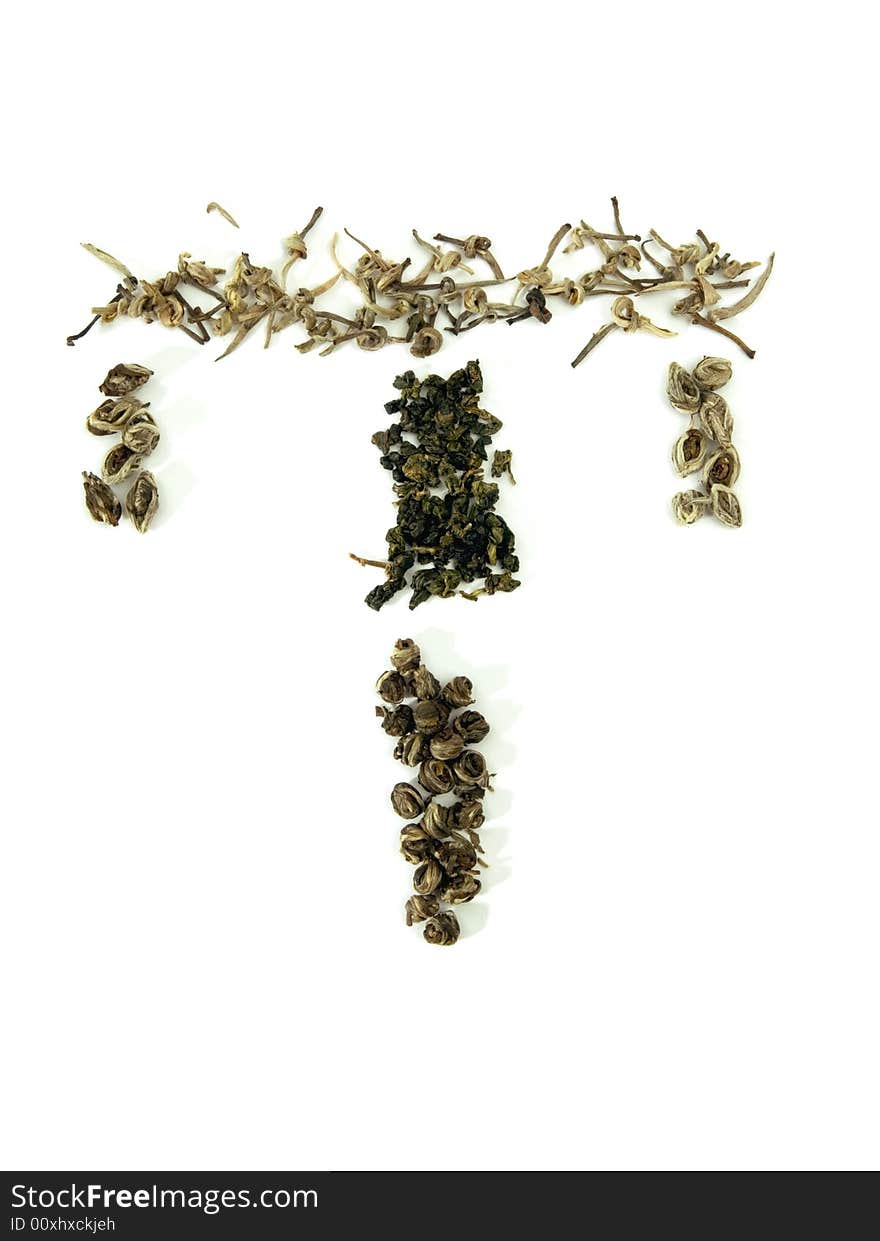 The letter T spelled out in green tea leaves. Isolated on white background. The letter T spelled out in green tea leaves. Isolated on white background.