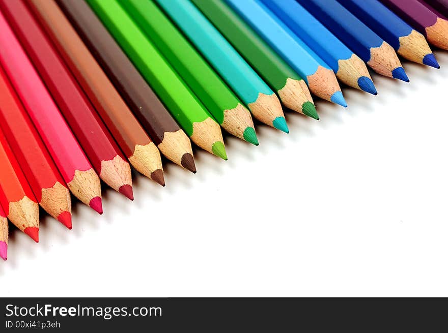 Thick colored pencils against a white background color