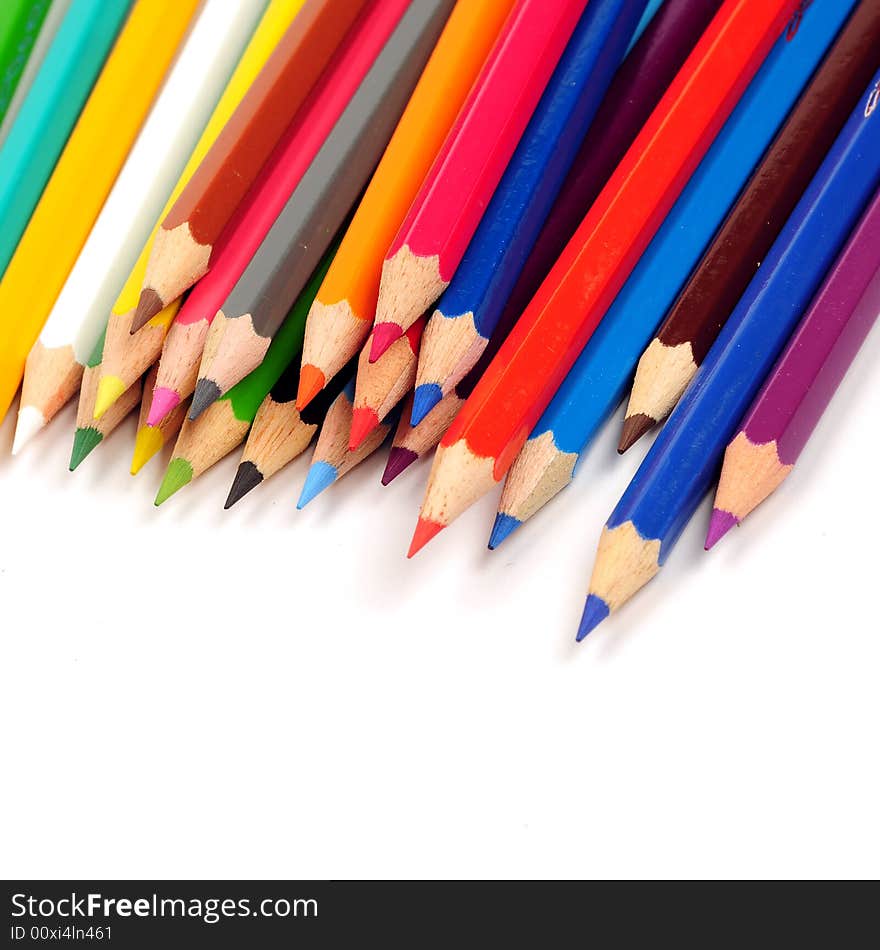 Thick colored pencils against a white background color