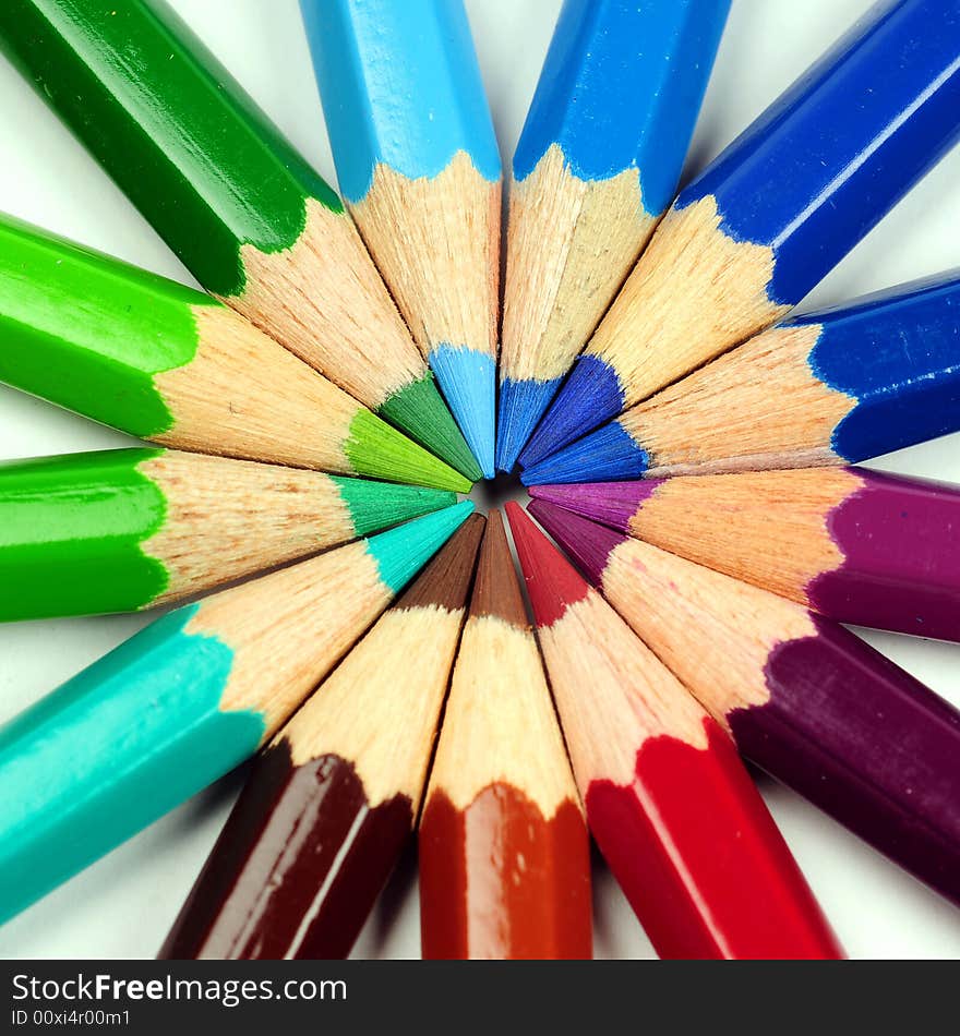 Thick colored pencils against a white background color