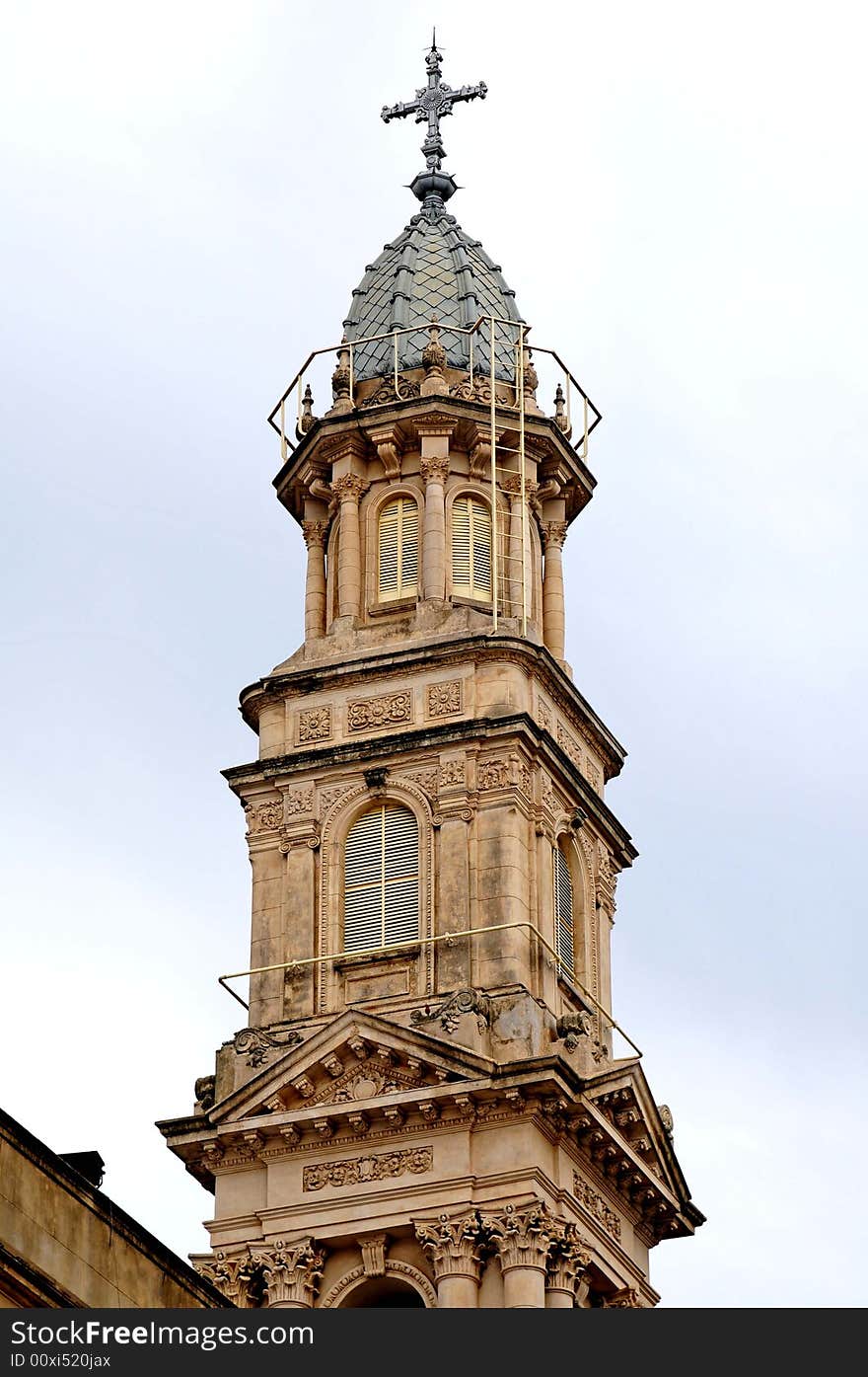 A tall tower in a catholic church. A tall tower in a catholic church