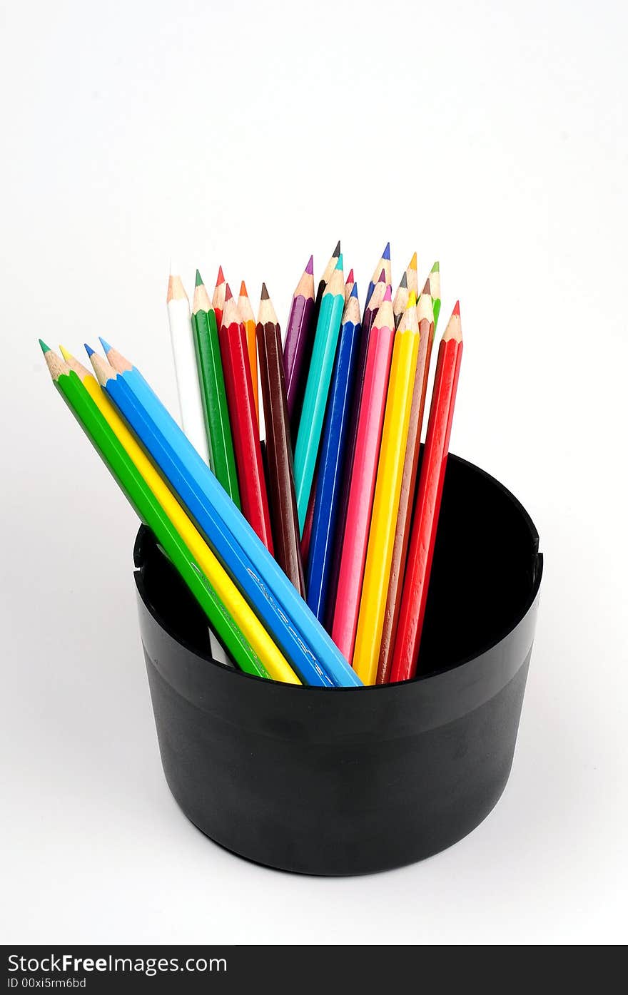 Thick colored pencils against a white background color